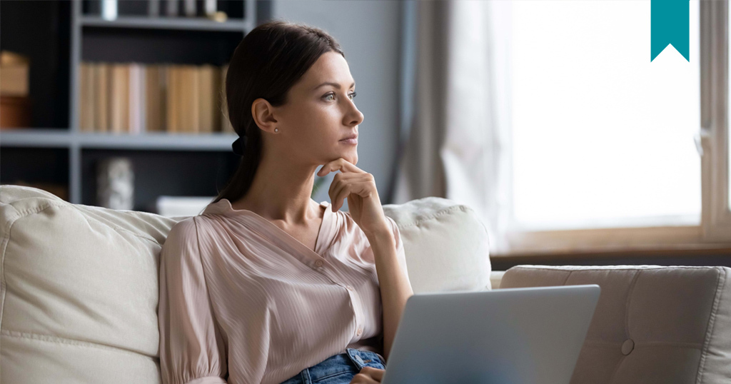 Woman thinking about choosing between rent reporting agencies