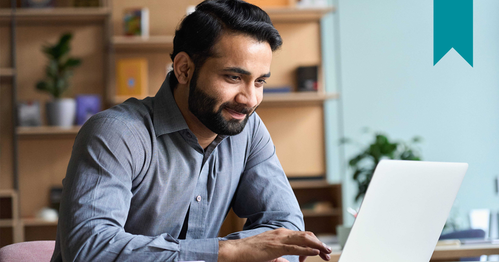 Young Indian Man Reporting Rent to TransUnion with FrontLobby on laptop