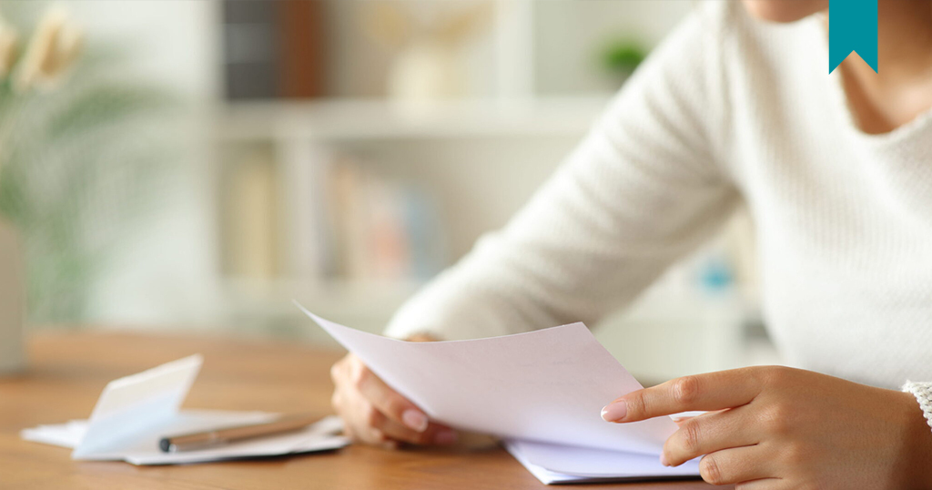 Female Tenant reviewing credit report.